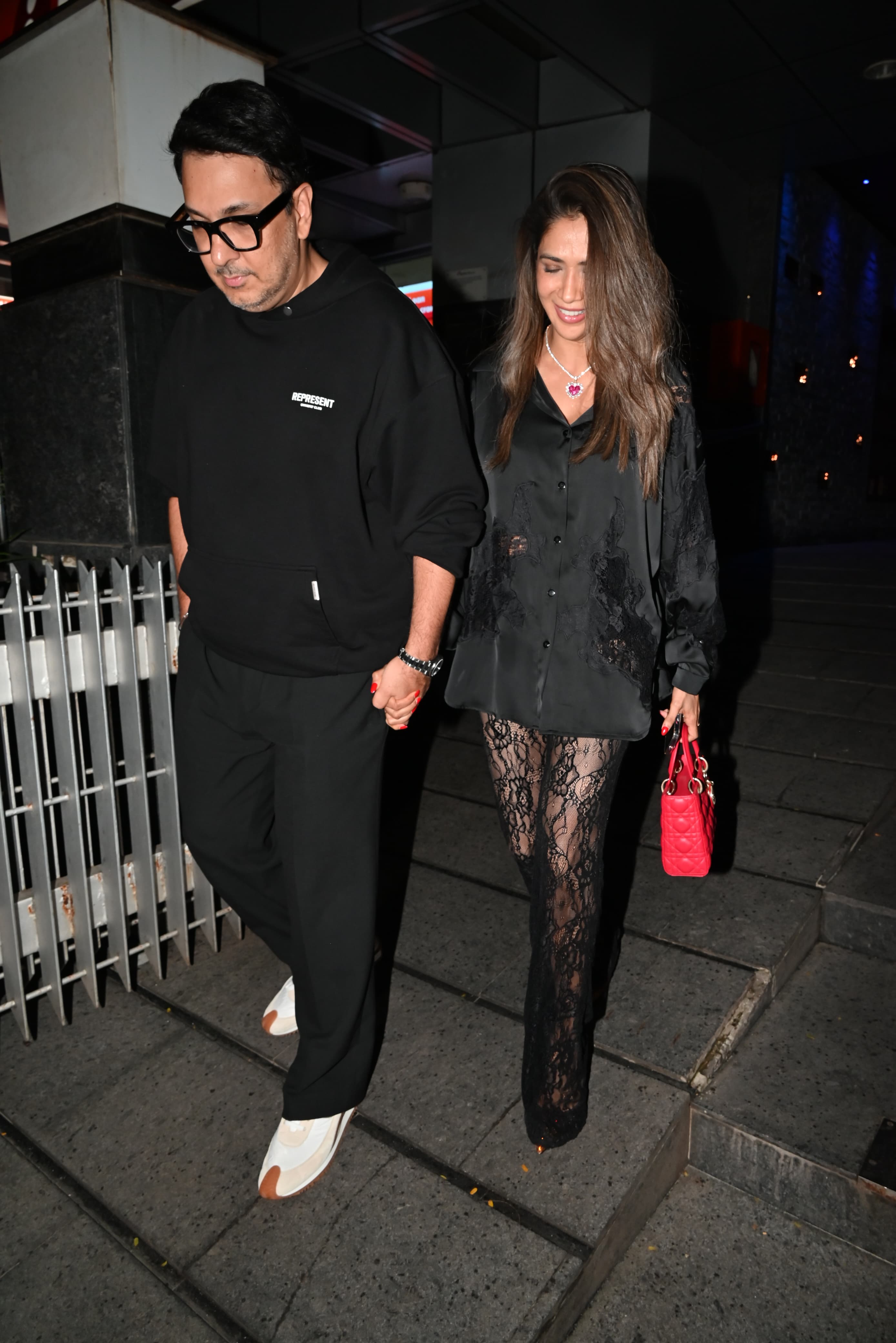 Dinesh Vijan was clicked with his wife. The couple stunned in coordinating black outfits