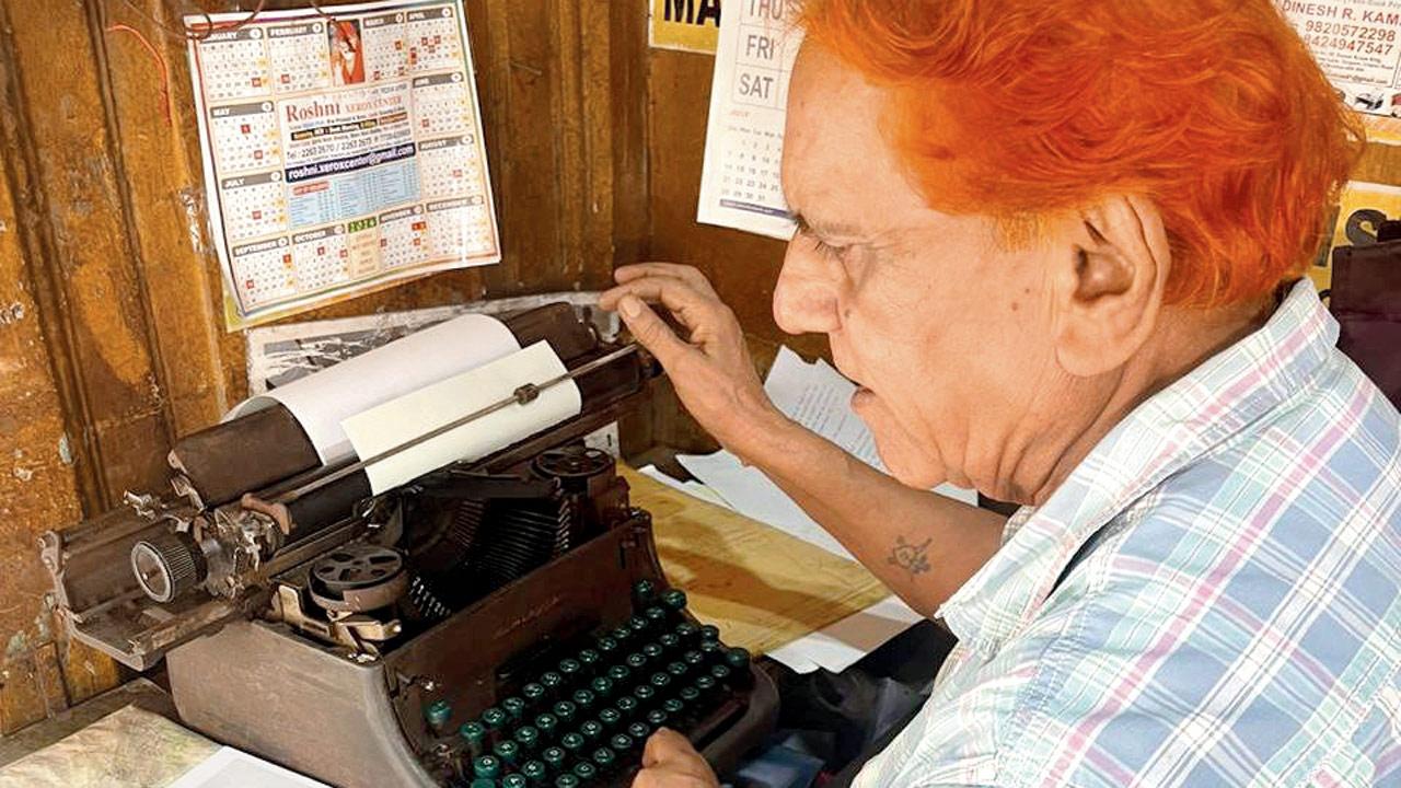 Babubhai types out Sana Ginwalla’s poem on his typewriter