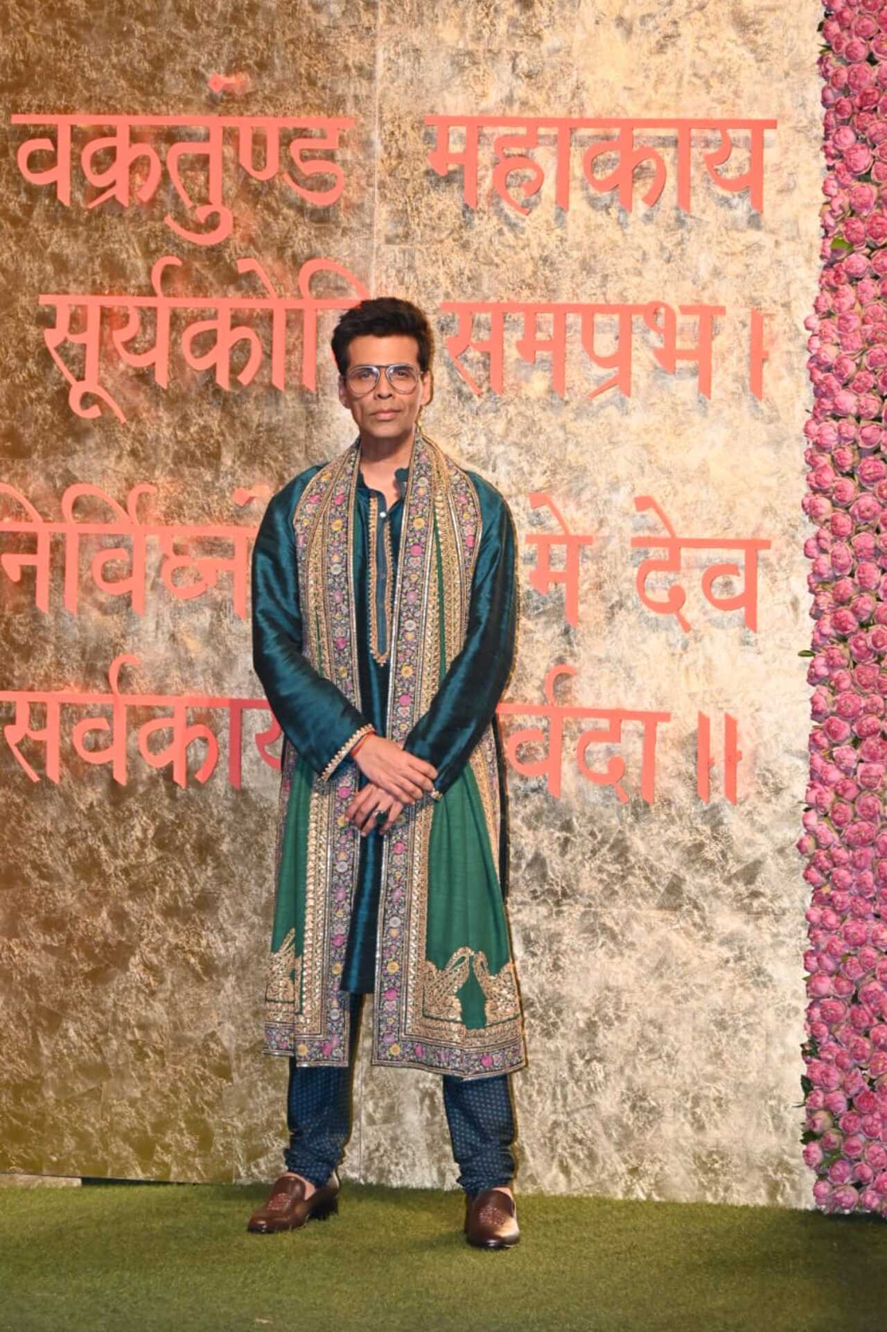 Karan Johar dons a peacock green kurta for the night 