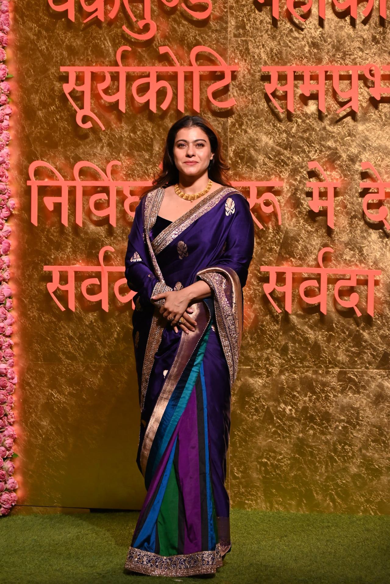 Kajol looked elegant as always in this deep blue saree for the occasion