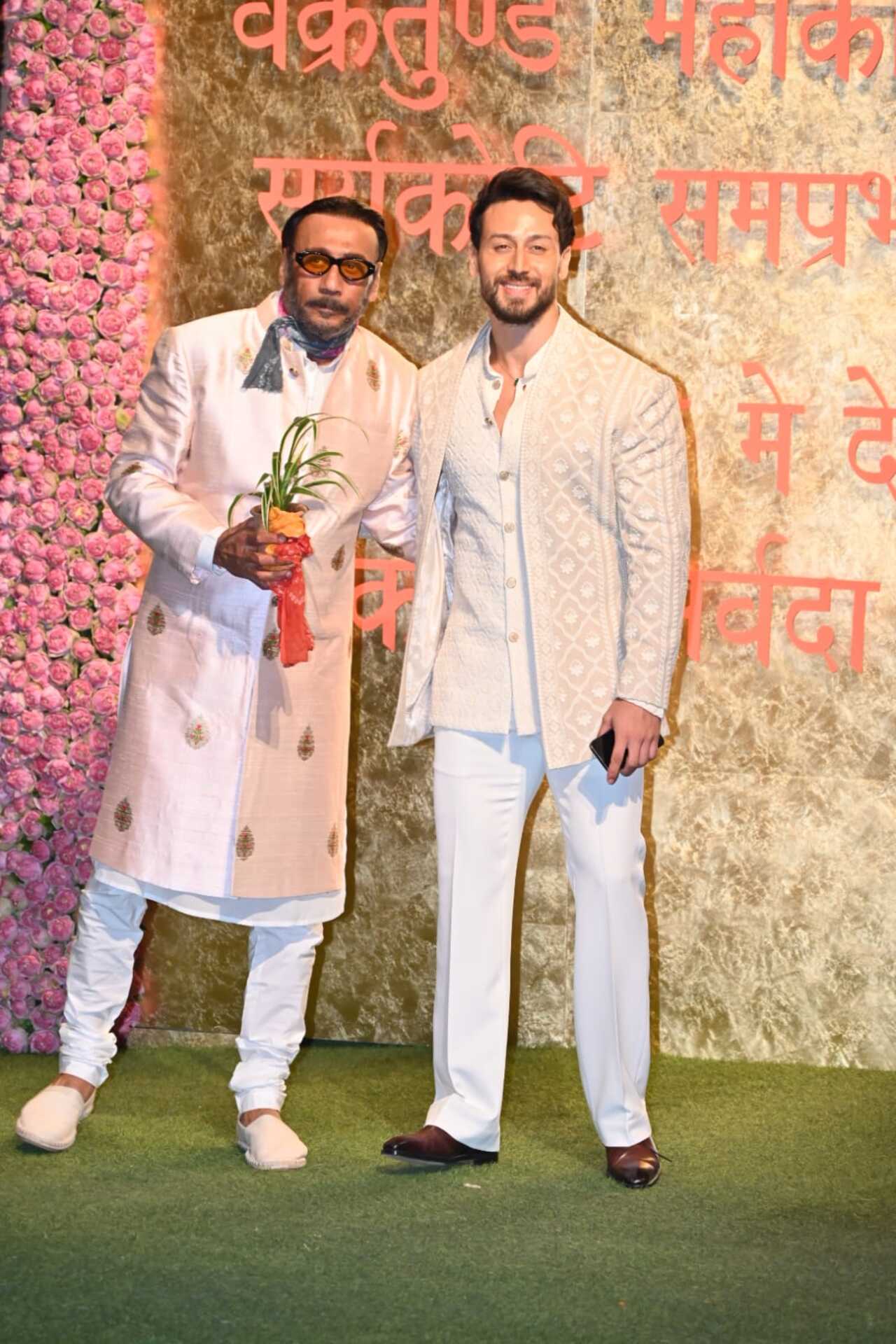 Father-son duo Jackie and Tiger Shroff twin in white ensembles for the night. Senior Shroff continues with his tradition of gifting saplings wherever he goes