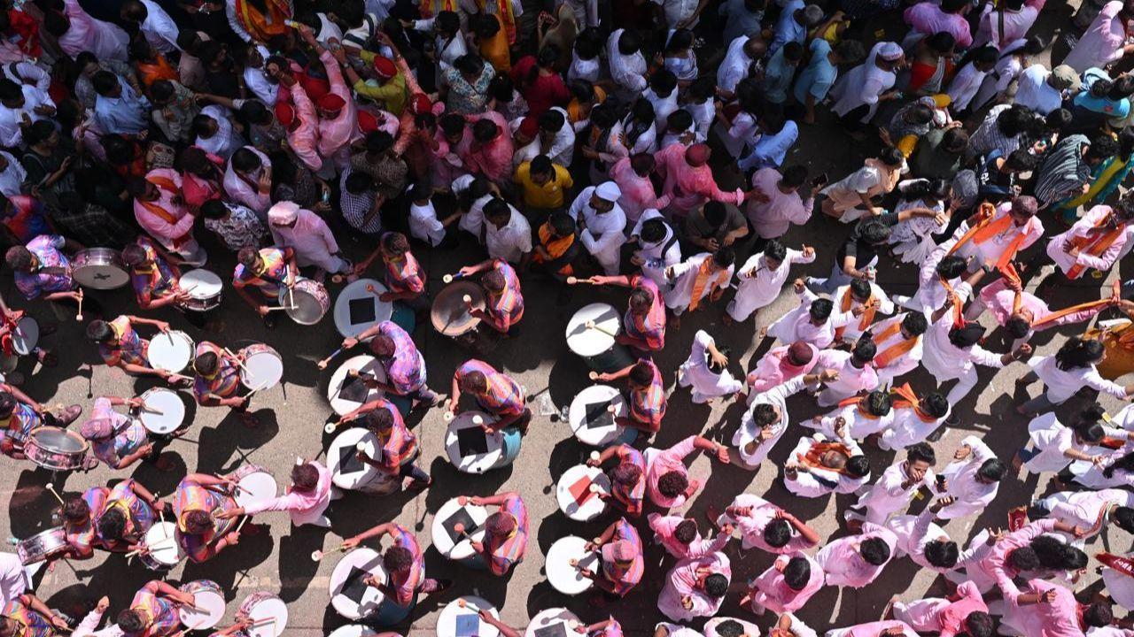 IN PHOTOS: Lalbaugcha Raja idol leaves pandal for immersion with grand processio