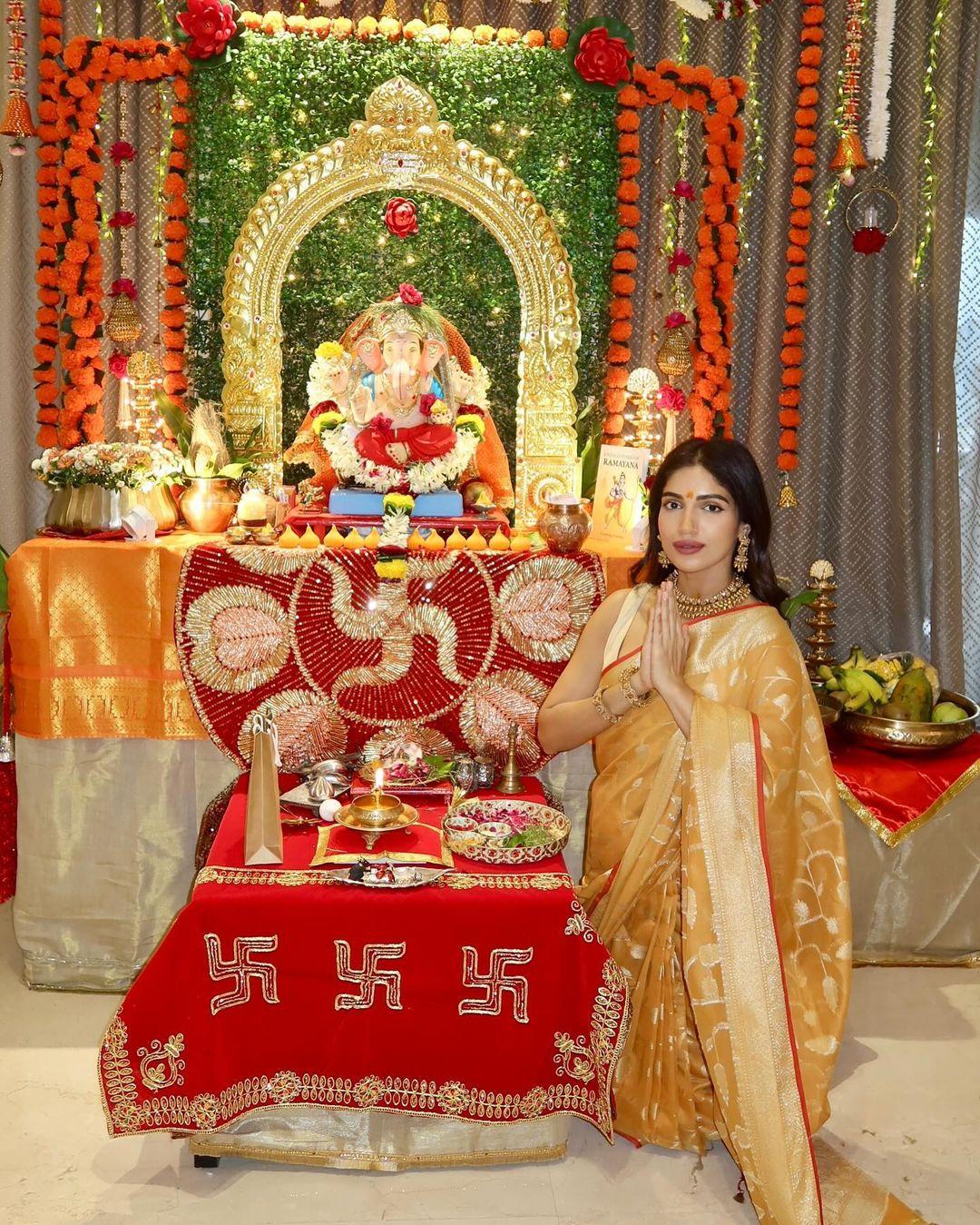 Bhumi Pednekar dazzles in a golden ethnic outfit as she poses beside her Ganesh idol
