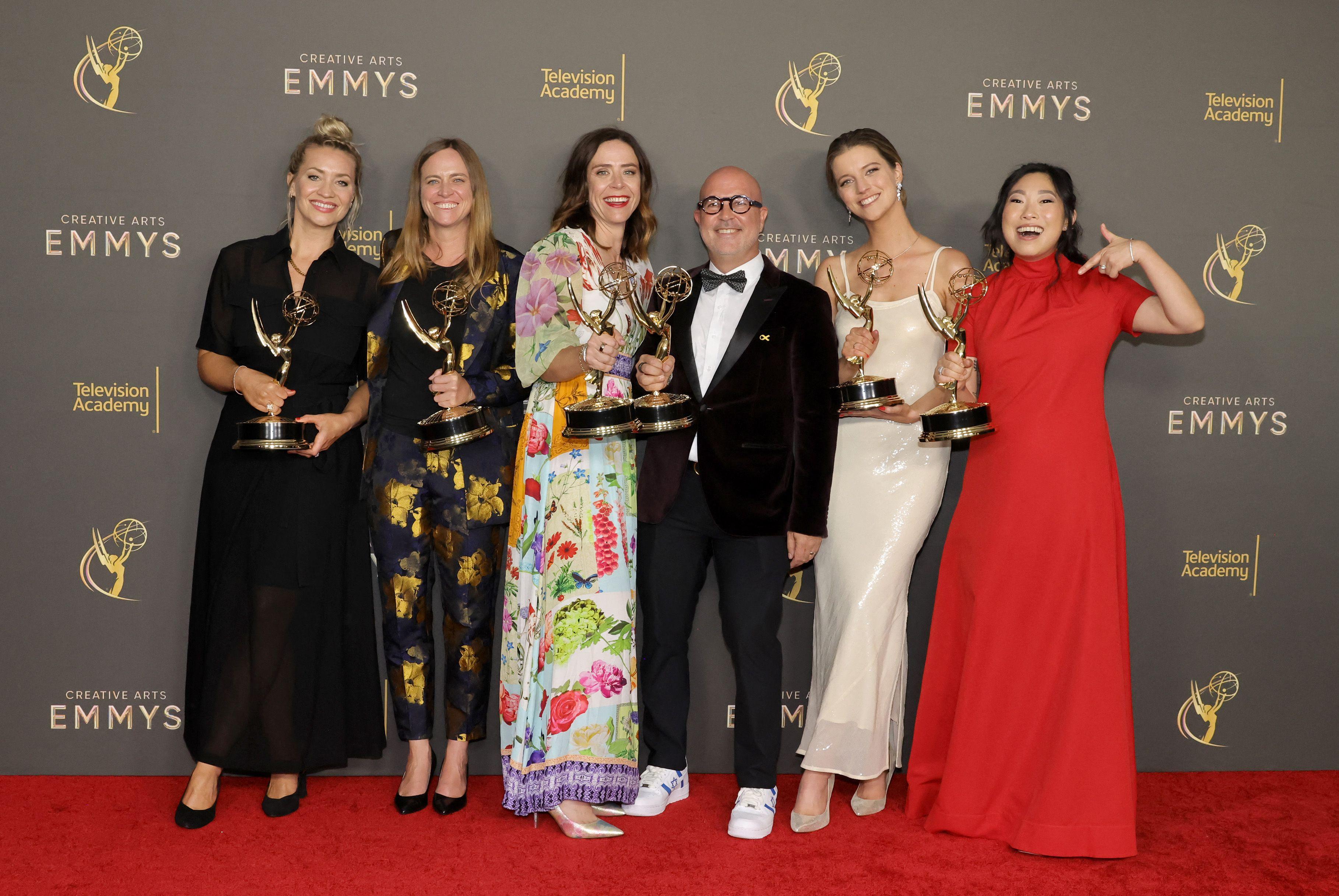 (L-R) Alex Brown, Erika Hampson, Maggie Haskins, Itay Reiss, Jen D'Angelo, and Awkwafina, winners of the Emmy Award for Outstanding Television Movie for Quiz Lady