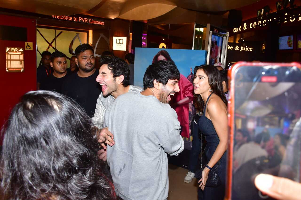 Ibrahim and Kartik break out into a laugh as Sara looks on. We wonder what cracked up the boys