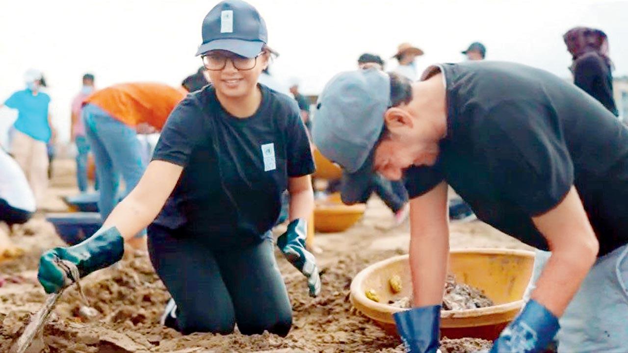 Prajakta Koli with Afroz Shah in a moment from the beach clean-up video by the UNDP India. Pic Courtesy/@undpinindia