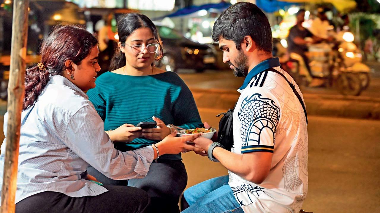 Customers gather at the stall