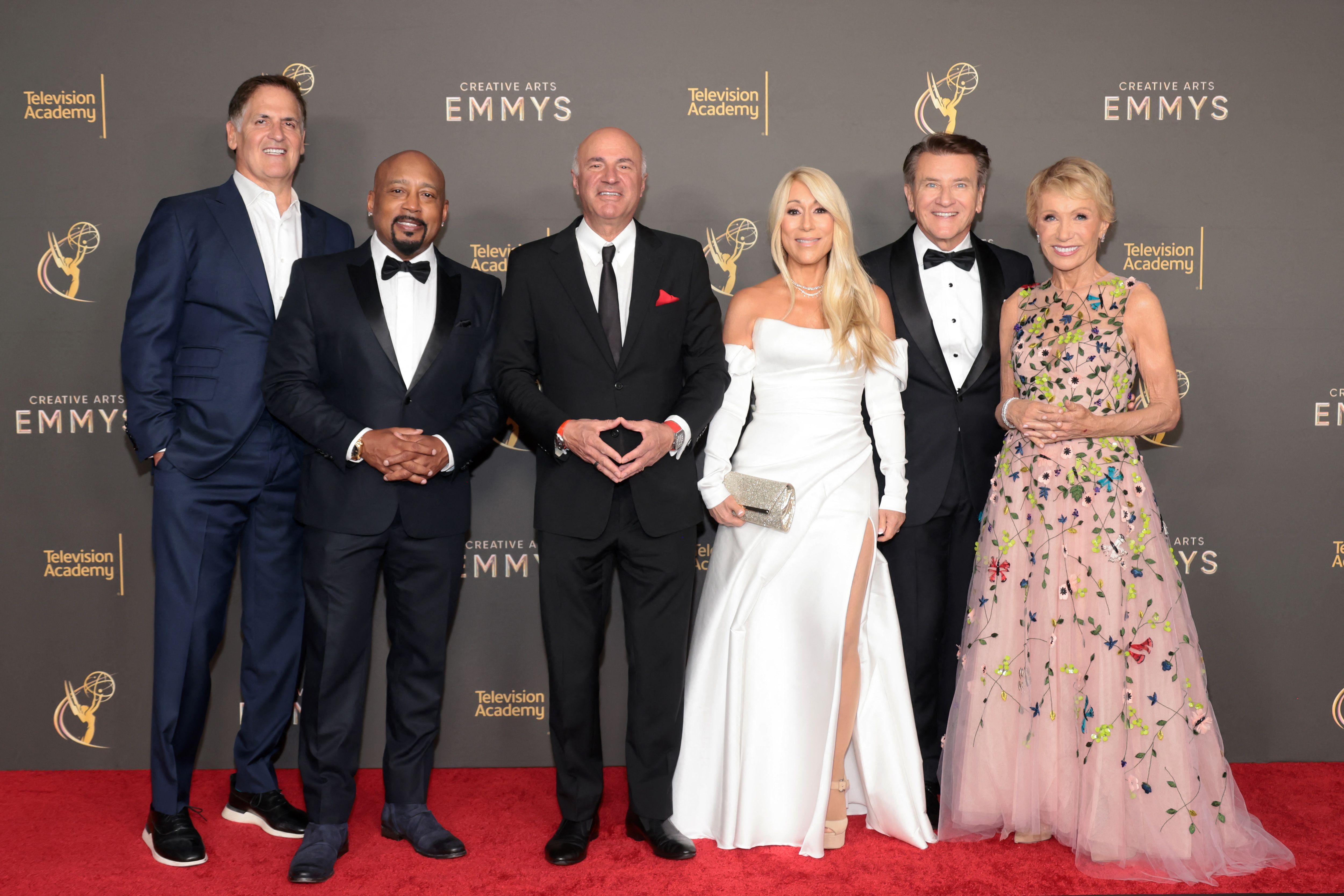 (L-R) Mark Cuban, Daymond John, Kevin O'Leary, Lori Greiner, Robert Herjavec, and Barbara Corcoran attend the 76th Creative Arts Emmys Winner's Walk at Peacock Theater