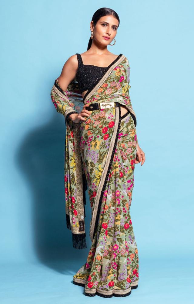 In this standout look, Shaikh embraced a minimalist yet sophisticated style, as she wore a soft saree adorned with floral patterns.