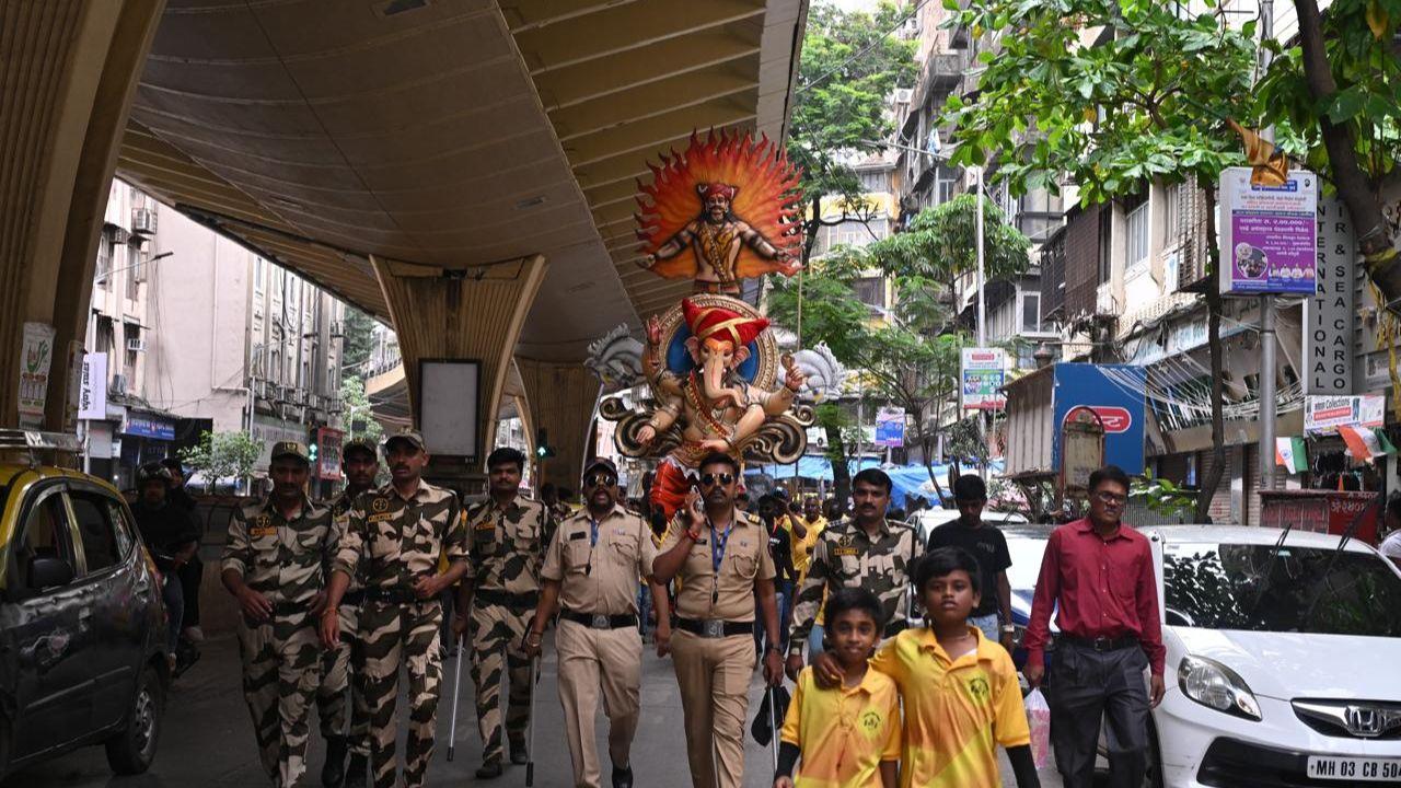 The processions are marked by vibrant displays of devotion, with elaborately decorated idols, colourful attire, and rhythmic music filling the streets of Mumbai.