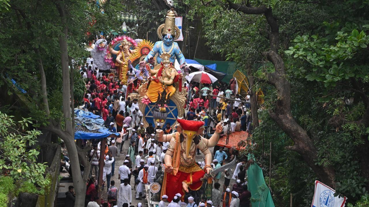 The idols are installed in pandals with the Pranapratishtha ritual, where devotees perform prayers and offerings, invoking Lord Ganesha's presence and blessings.