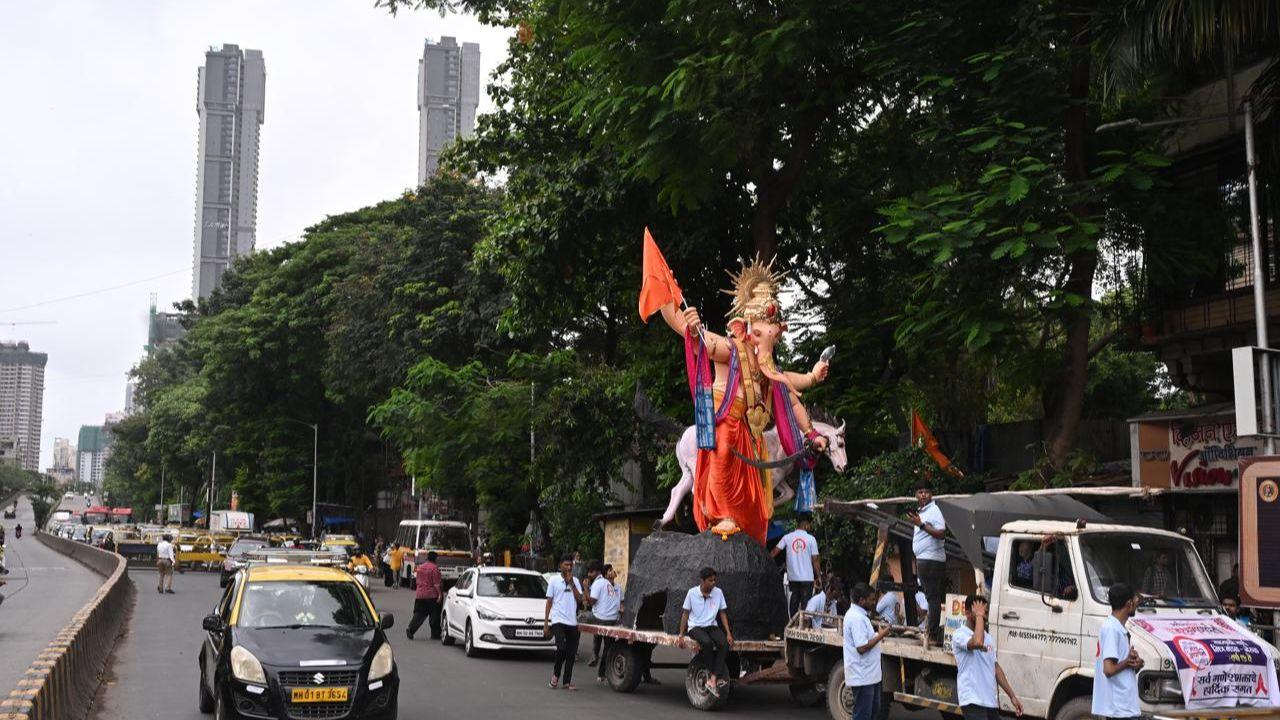 The processions of Ganpati idols to pandals in Mumbai symbolise the welcoming of Lord Ganesha into homes and communities, heralding wisdom, prosperity, and new beginnings.