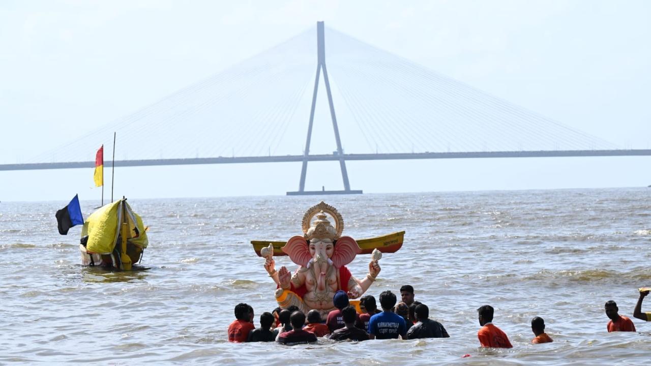 Devotees thronged the streets, especially on the main road leading to the Girgaon beach, in large numbers, eager to catch a final glimpse of the elaborately adorned idols of the elephant-headed god when they are taken out of pandals for their journey to immersion sites