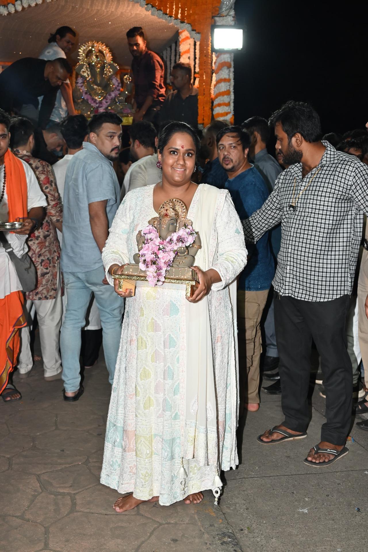 Salman Khan's sister Arpita Khan Sharma holds baby Ganpati as they prepare for visarjan