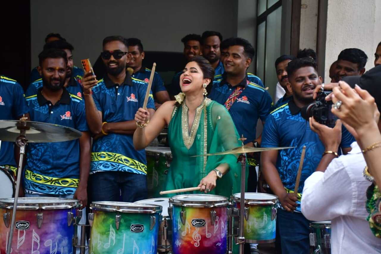 Shamita Shetty plays the dhol during visarjan and chants loudly as she does so