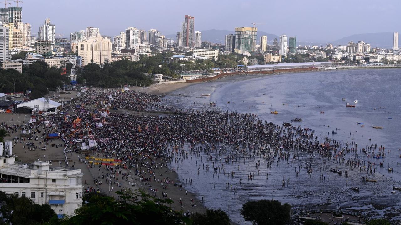 Devotees thronged the streets, especially on the main road leading to the Girgaon beach, in large numbers