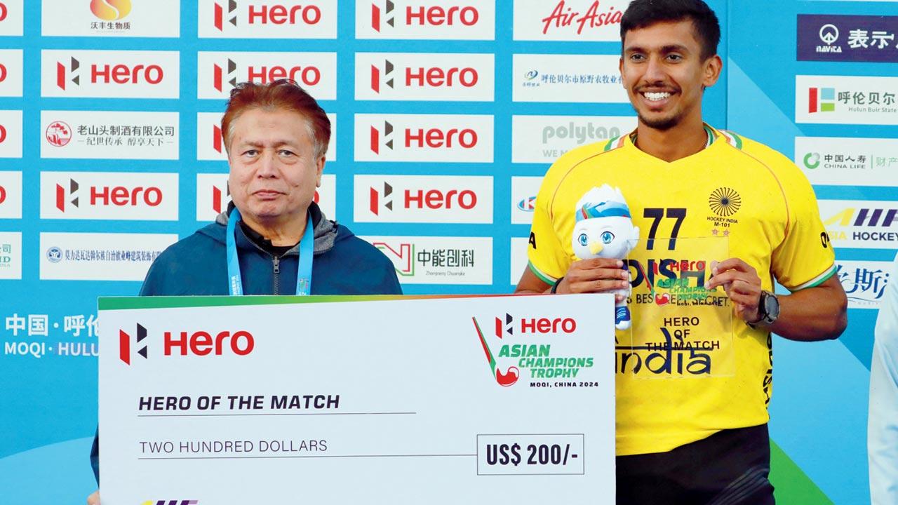 Mumbai-based India goalkeeper Suraj Karkera gets the Hero of the match award. Pic/Hockey India