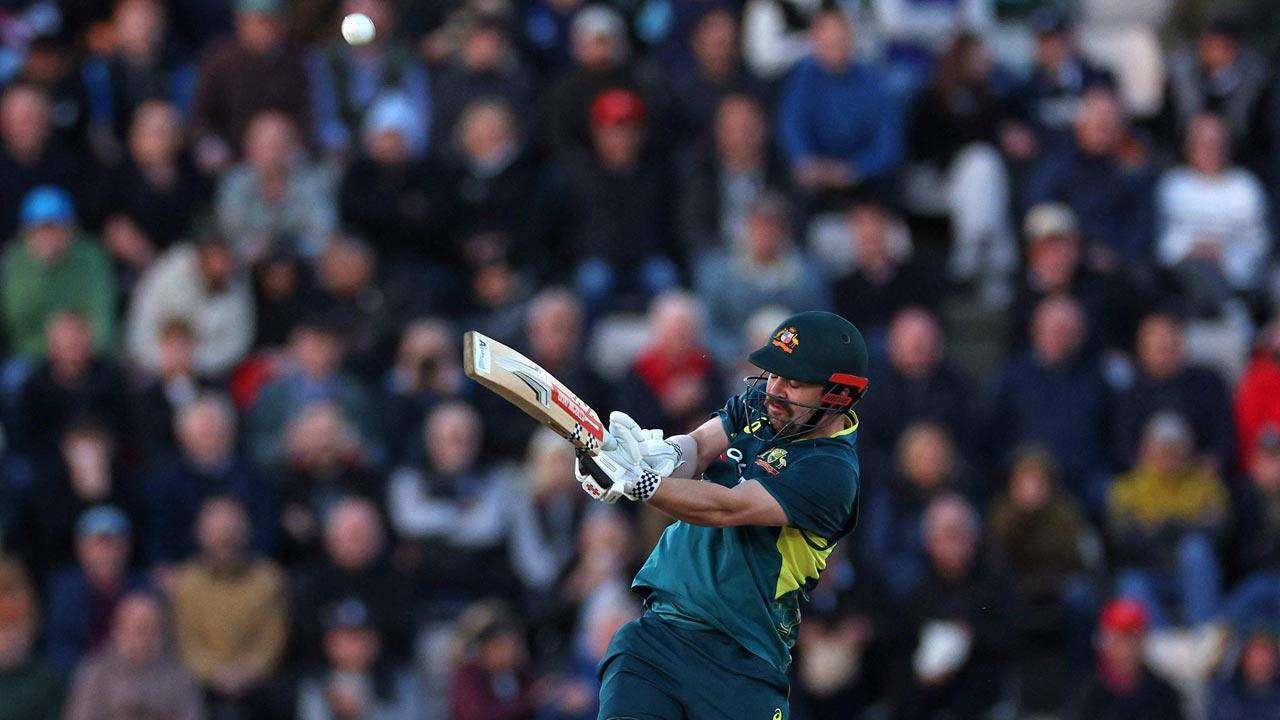 Head shines as Oz beat England