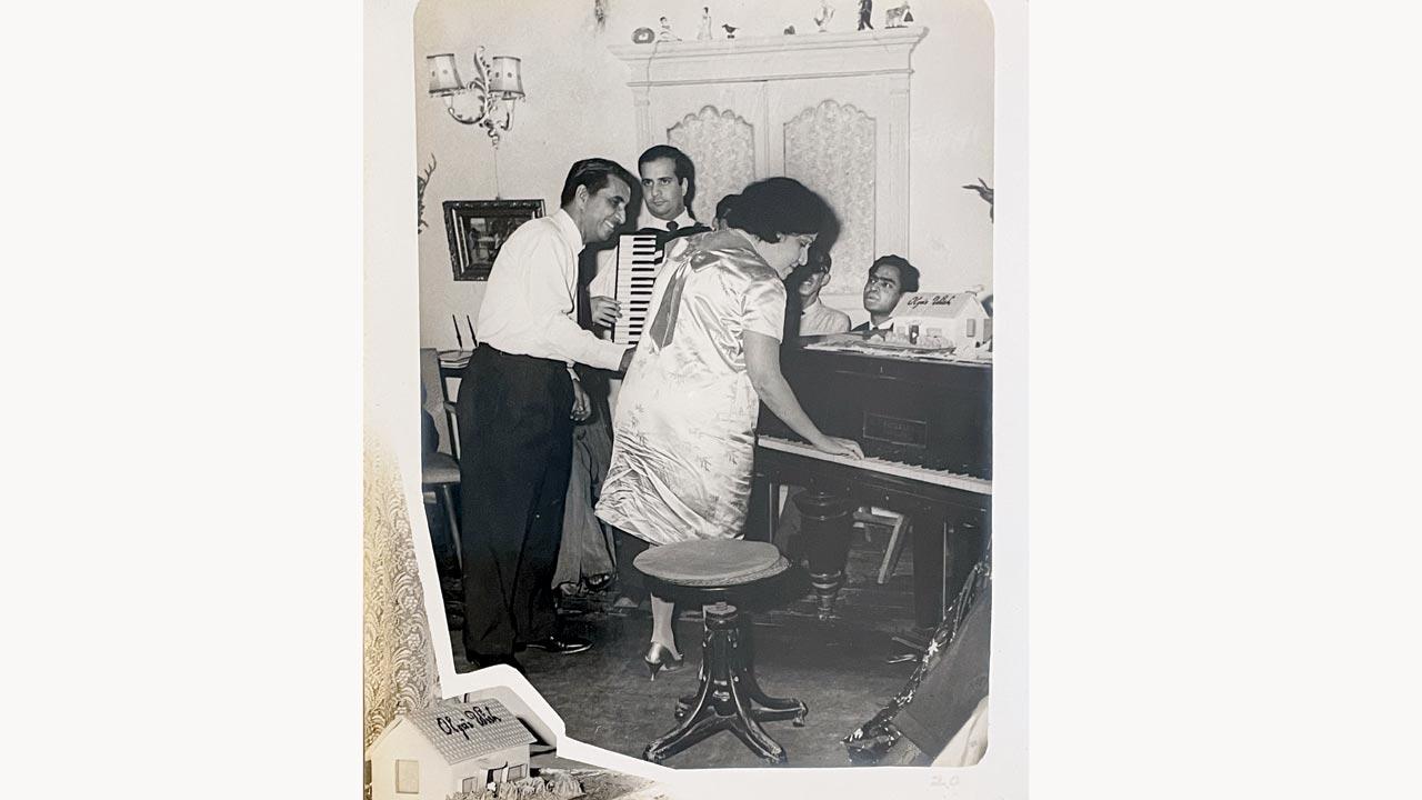 Olga Craen playing the piano at a party