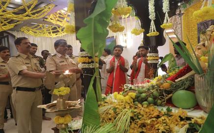 Cops perform the Ganeshotsav rituals at CM Eknath Shinde's official residence on Monday.
