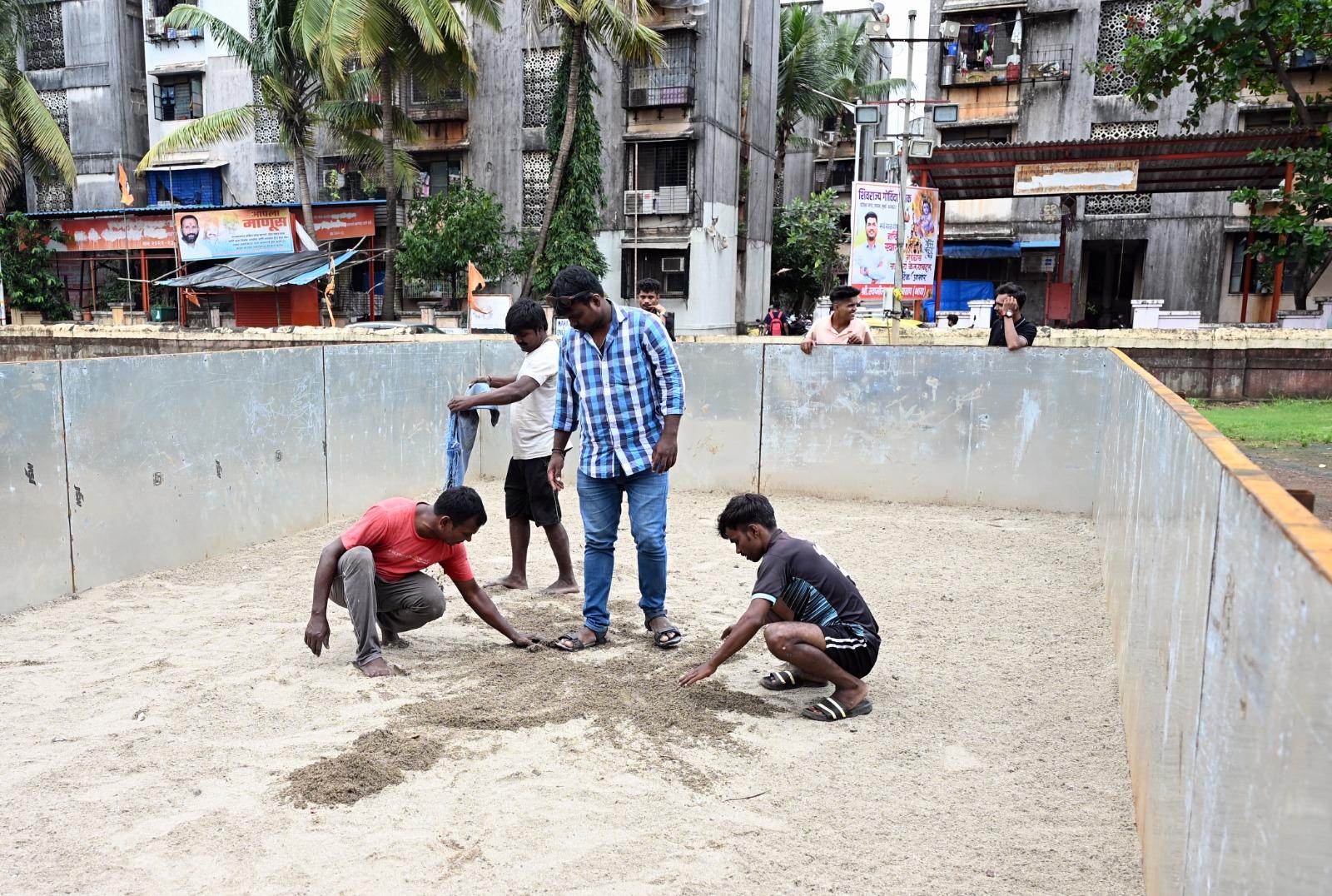 Workers prepare the artificial pond at Pratiksha Nagar in Sion on Friday