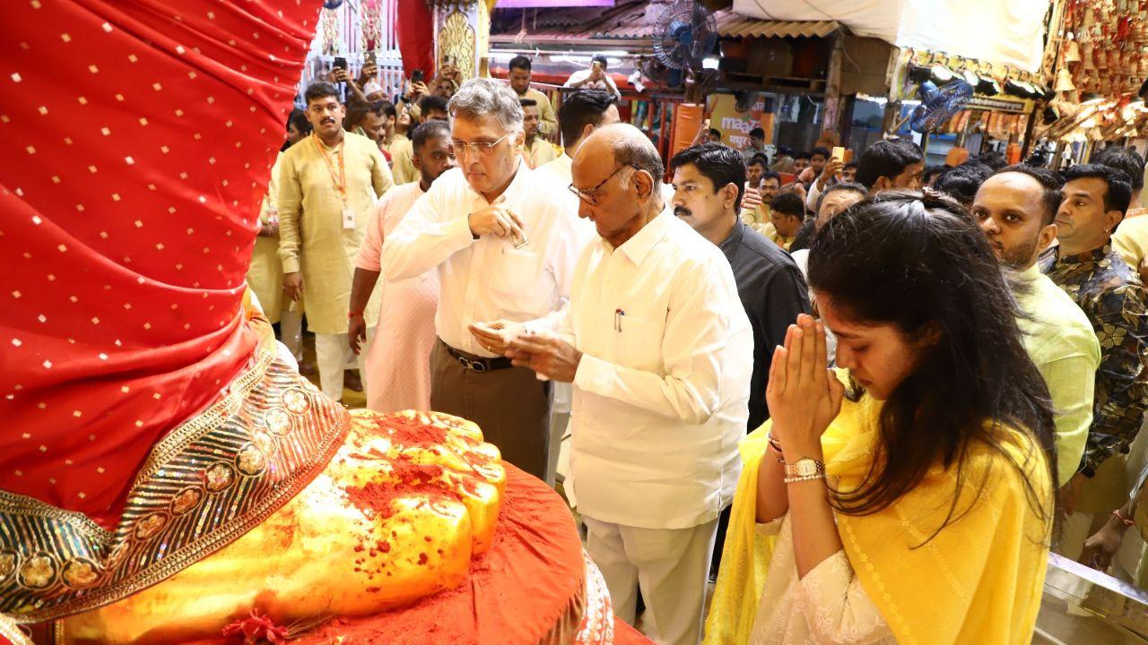 The iconic Ganesh idol, housed at the Lalbaugcha Raja Sarvajanik Ganeshotsav Mandal, is a central attraction during this vibrant festival, drawing thousands of worshippers seeking blessings from the revered deity.