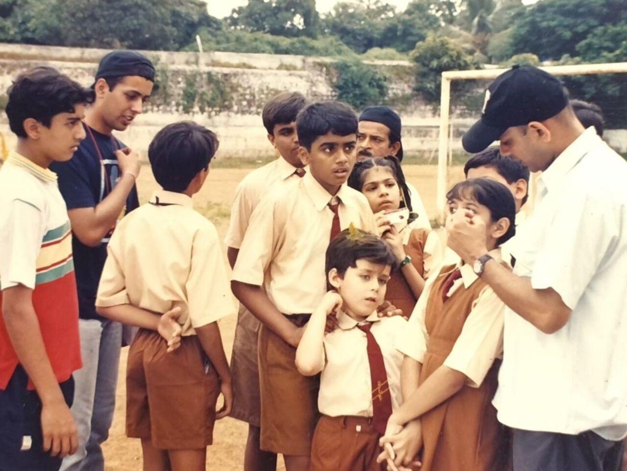 Fruity and other child actors shoot a football match scene in their school on the show