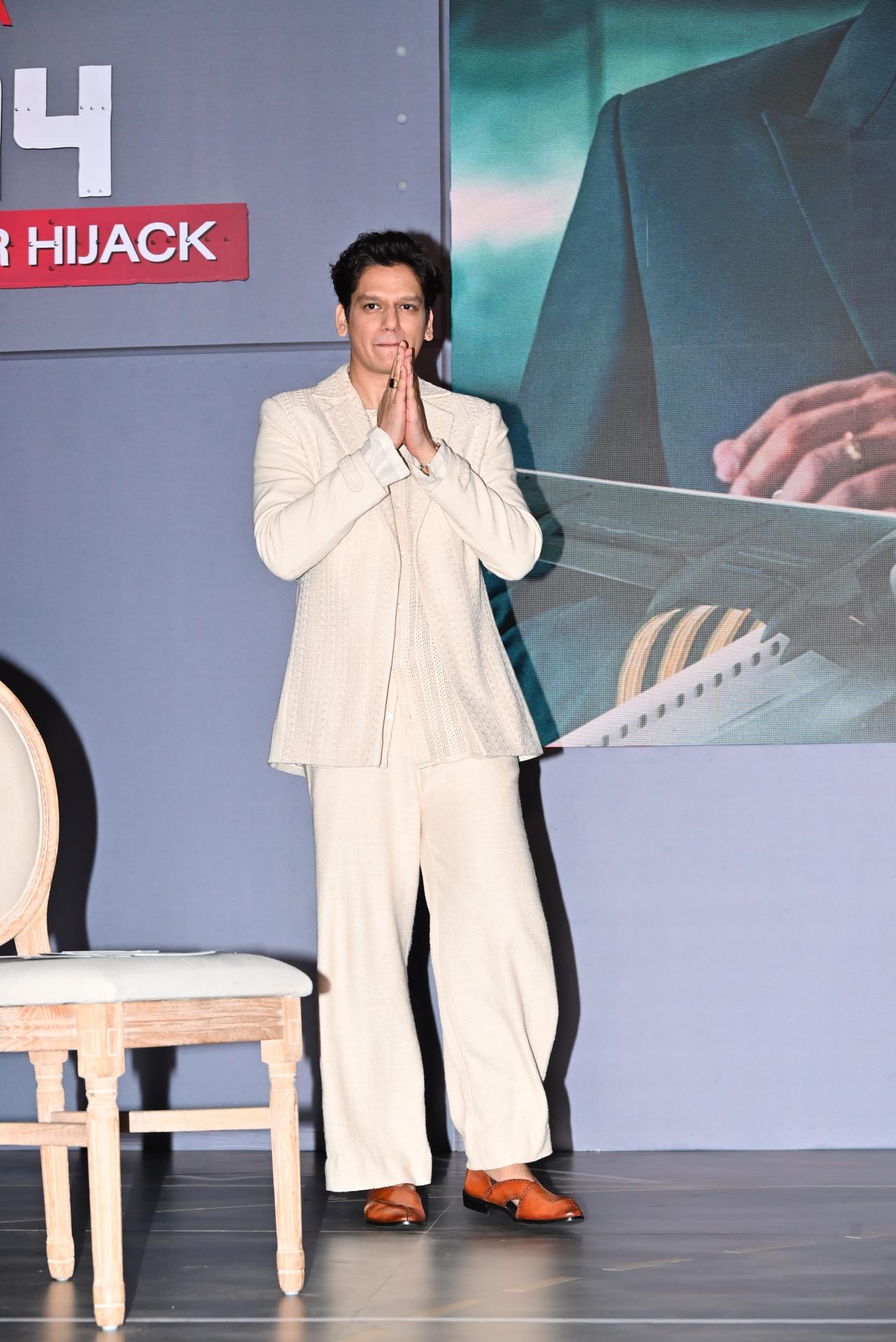 Vijay Varma looked dapper in a beige suit as he greeted the media. 