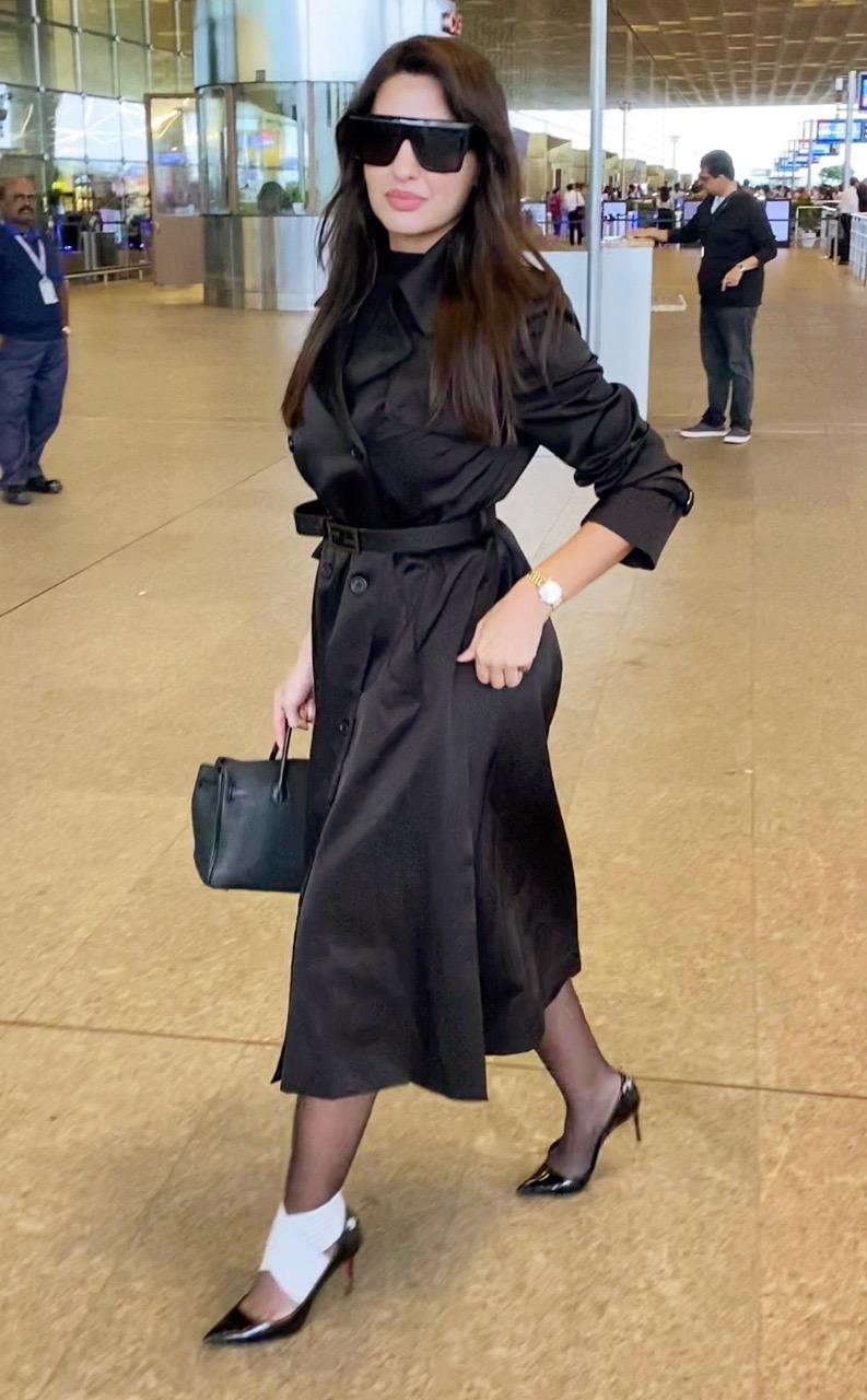 <p>Nora Fatehi was clicked at the Mumbai airport looking elegant as ever</p>