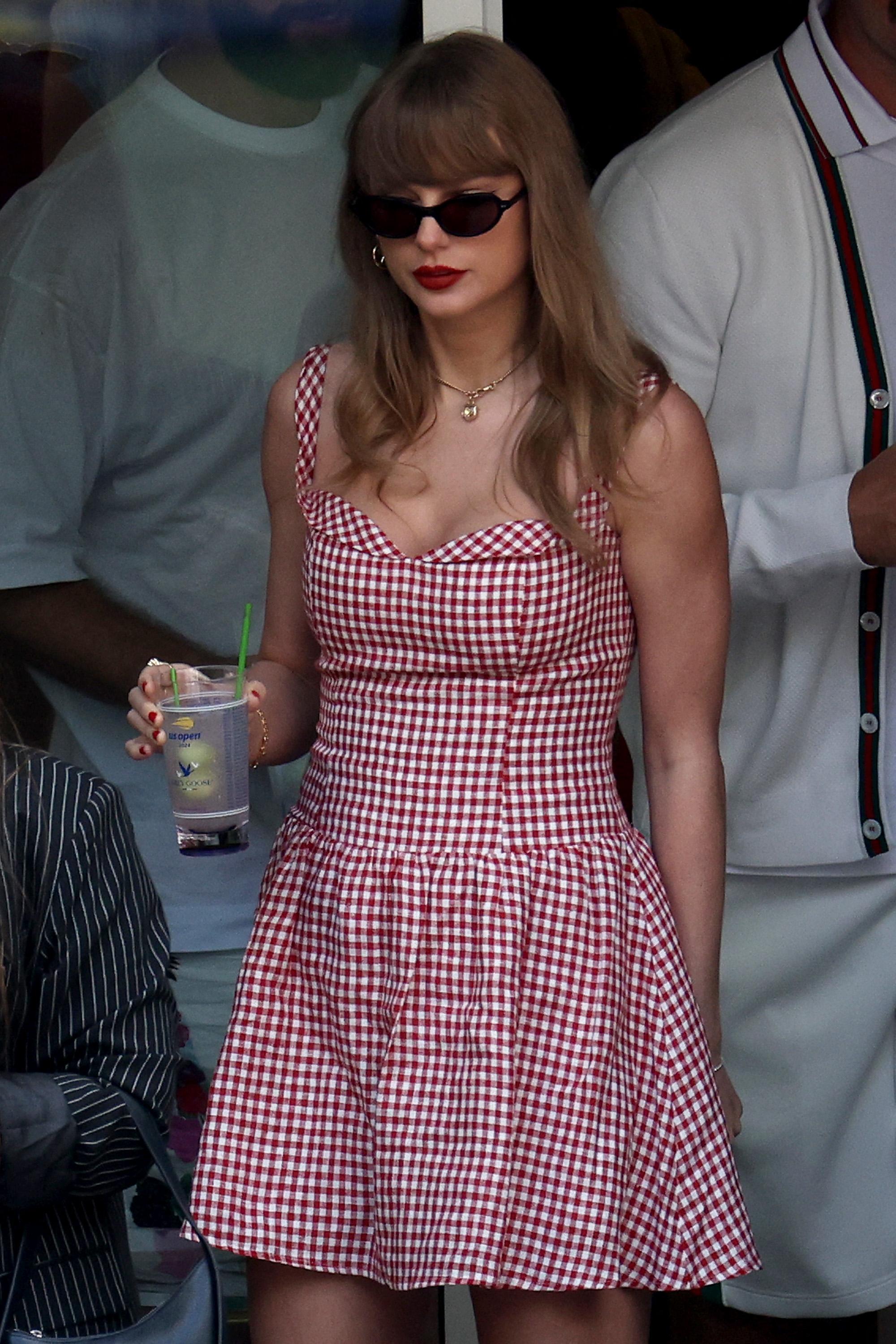 While attending the US Open men's final with Travis Kelce, Taylor embraced a vintage look. She wore a red and white gingham dress that gave off a classic, all-American feel.