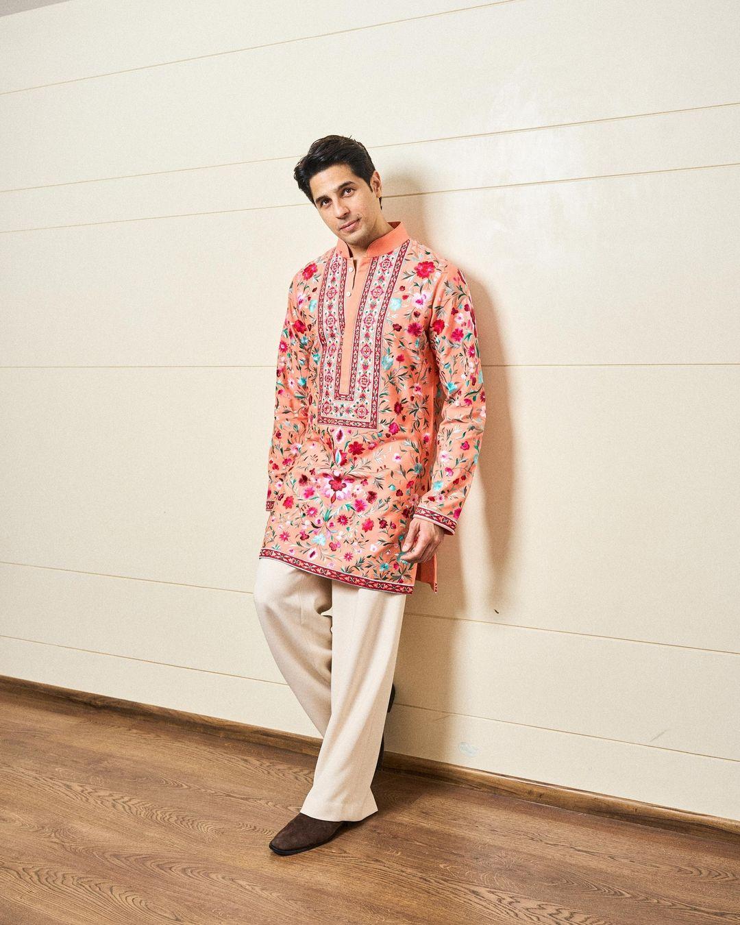 Sidharth Malhotra equally complemented his lady love in a printed short kurta paired with a white pajama