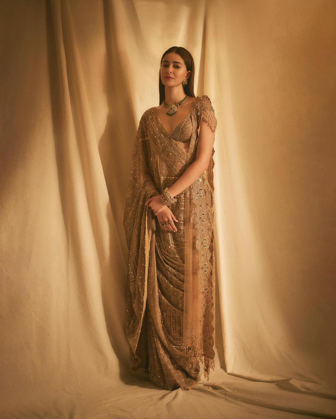 Glowing from the success of her recently released show, ‘Call Me Bae’, Ananya Panday was seen all glittery at the Ambani celebration. In a Tarun Tahiliani golden lehenga set, draped in a unique way, Ananya made our jaws drop