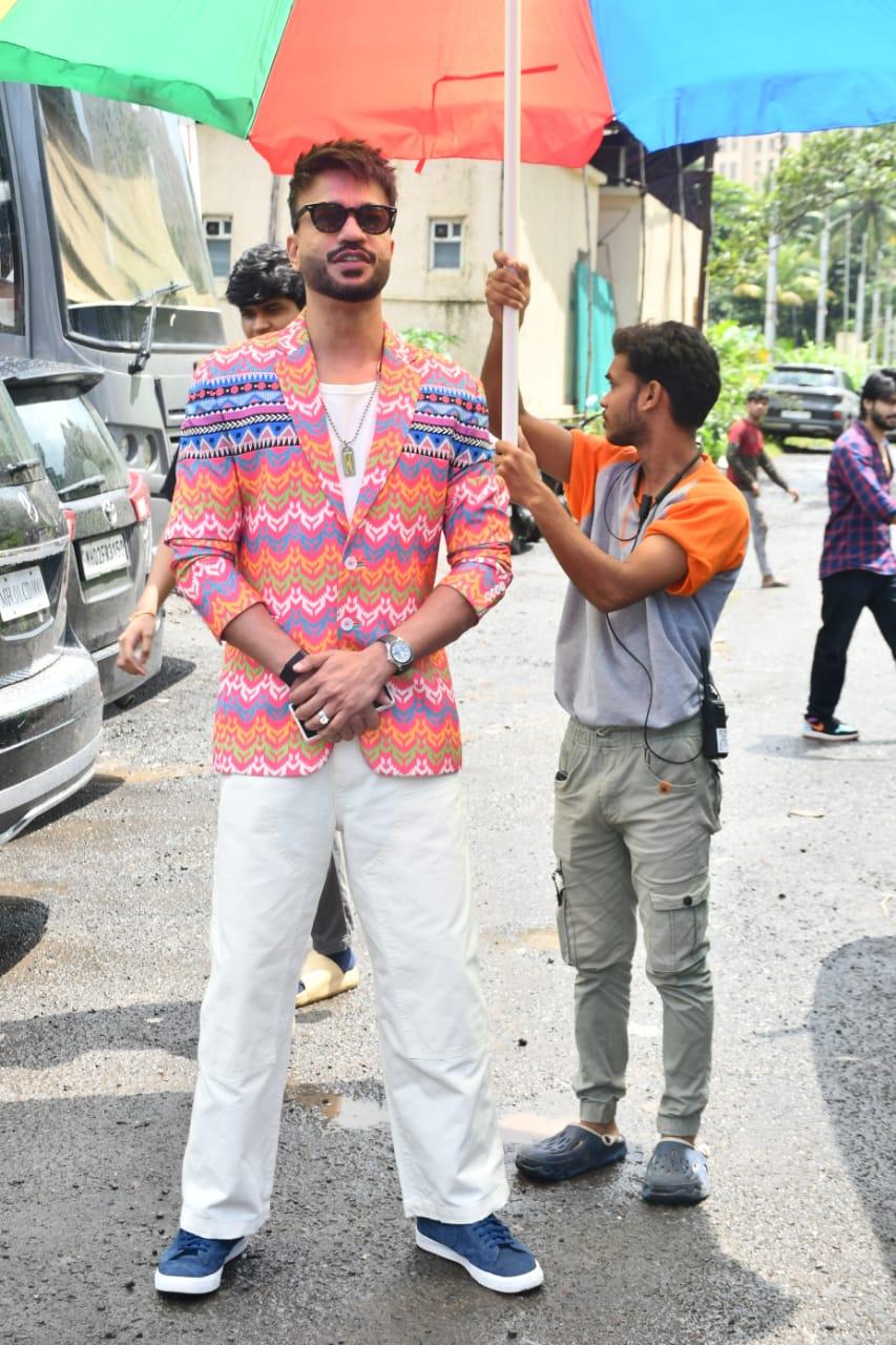 Vicky Jain, Anikita Lokhande's husband, wore a white on white outfit and paired it with multi-colored blazer