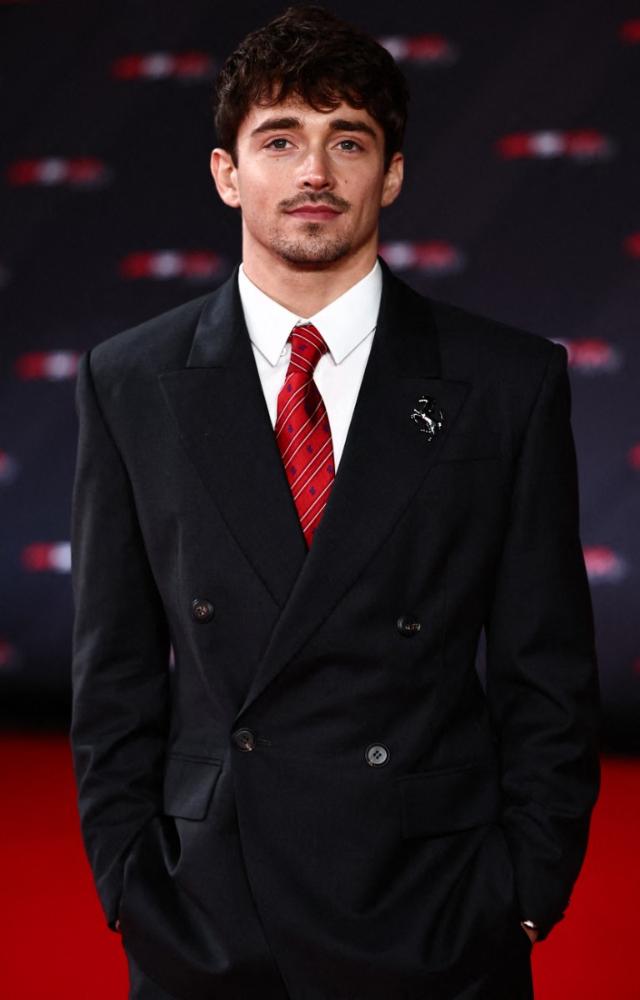 Charles Leclerc is another F1 style icon. He is often spotted in stylish denims, tees and jackets or sophisticated tailored fits. 