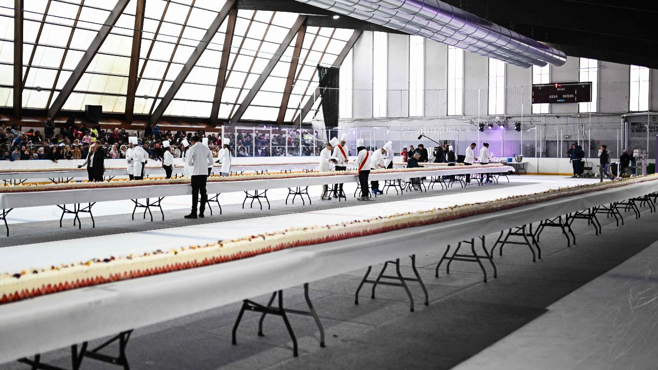 Youssef El Gatou brought together 20 chefs to make the 1.2 tonne masterpiece that took a week to complete and was set out on tables in an ice rink in the Paris suburb town of Argenteuil for residents to inspect