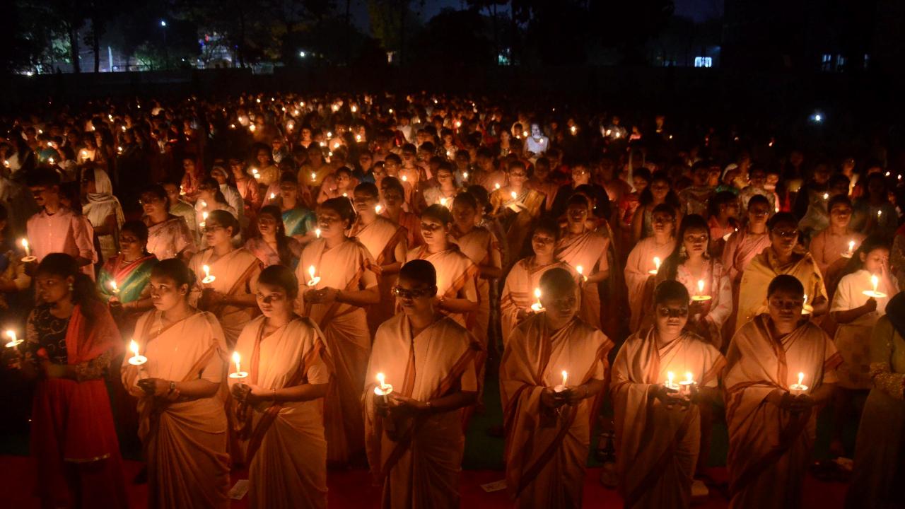 People attend the Easter Vigil mass in Patna on April 19
Easter Vigil, usually held on the eve of the festival, marks the first official celebration of the festival.