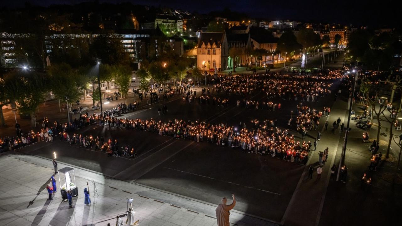 Worshippers took part in a torch-light parade and prayer service following the death of Pope Francis, outside the Sanctuaire Notre-Dame in Lourdes, southern France