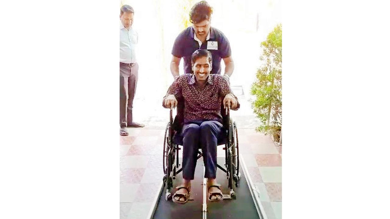 A differently abled individual tests the new ramp at the Mumbra school.  PIC COURTESY/RRajesh Patil