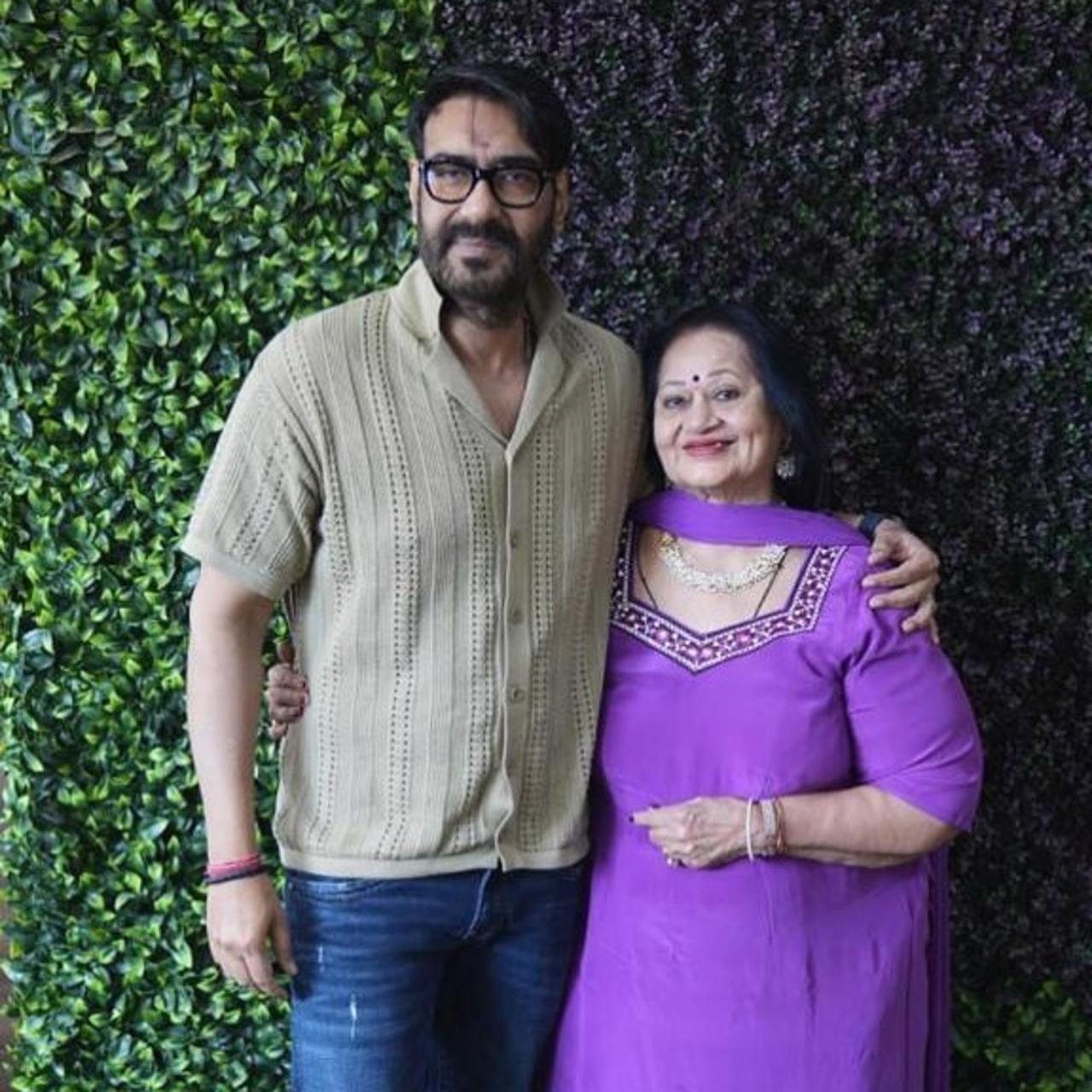 This click has Ajay Devgn posing for a happy picture with his mother