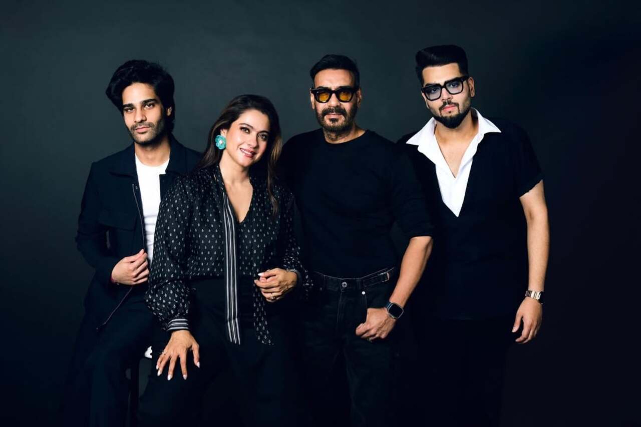 This snap shows Ajay Devgn and Kajol Devgn posing with their nephews, Aaman and Danish Devgn