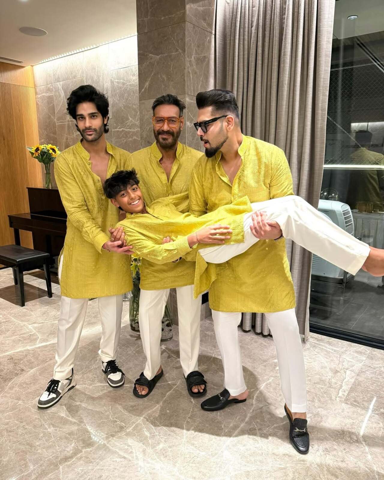 It looks like this is a Devgn family tradition, and Yug always gets to enjoy the green swing every time he is with his dad and brothers