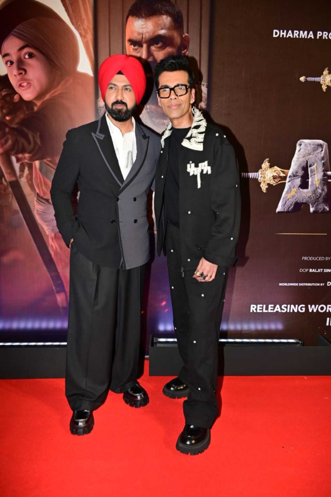 Karan Johar and Gippy Grewal posed together at the red carpet of the screening