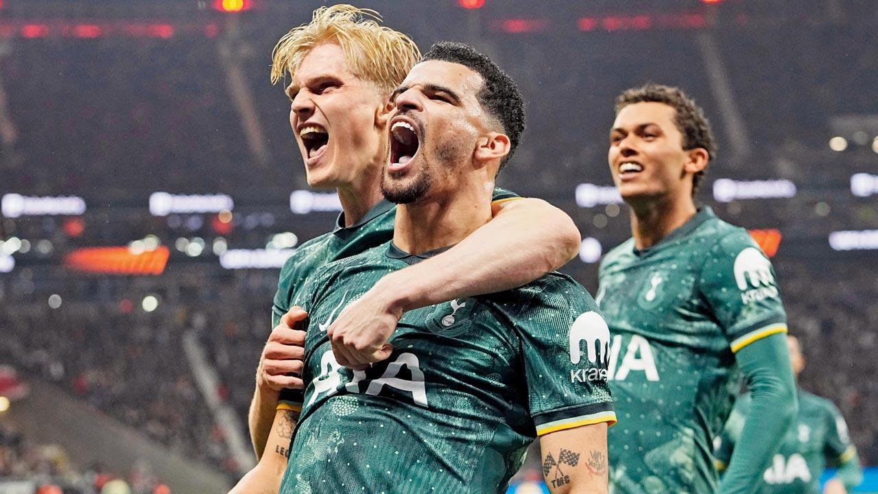 Tottenham players celebrate their goal vs Eintracht Frankfurt on Thursday. Pic/AP, PTI