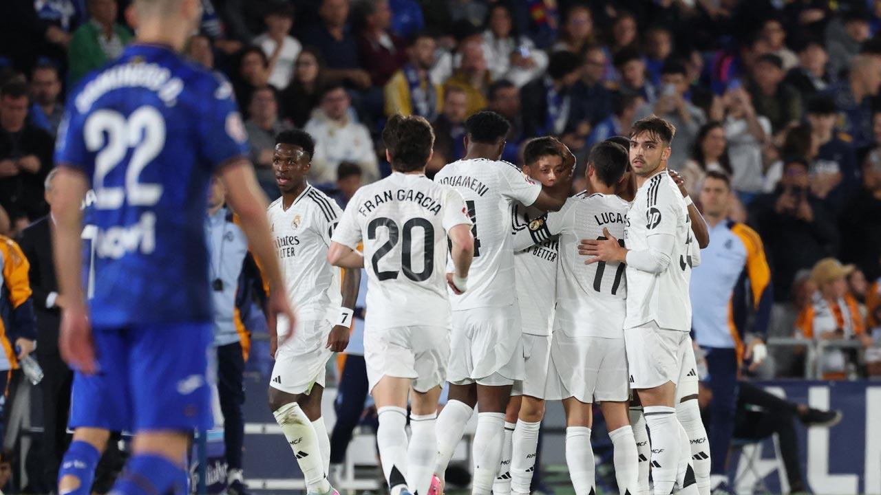 Real Madrid win at Getafe to keep La Liga title hopes alive