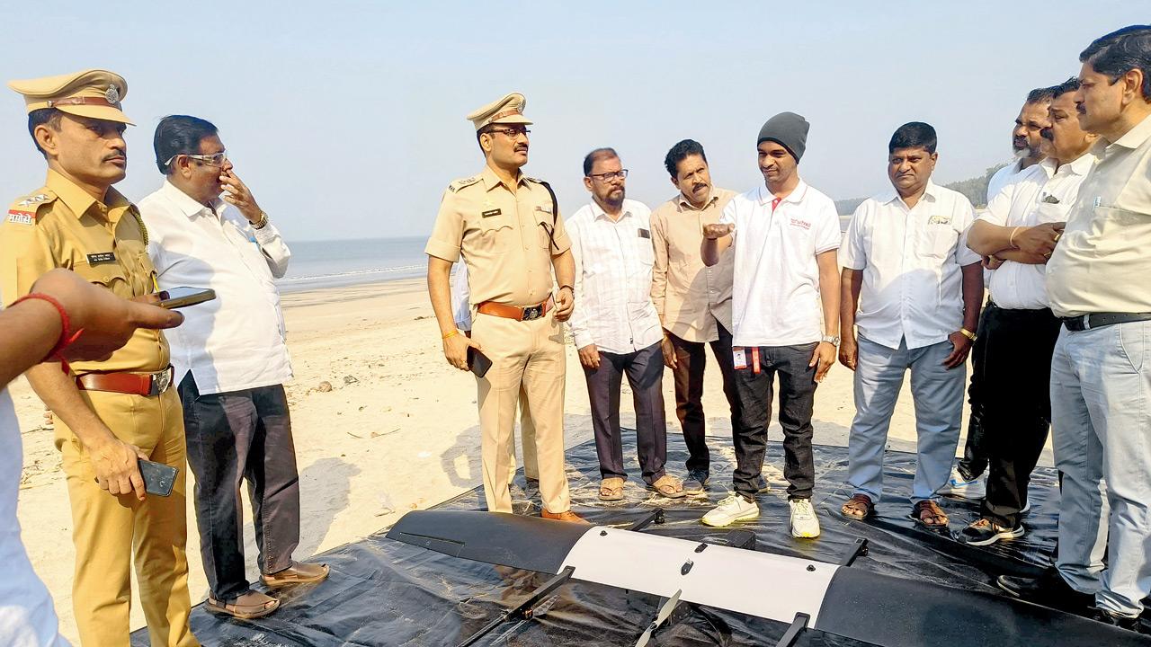 Balasaheb Patil, superintendent of police, Palghar (third from left) and other officials with a drone obtained from the fisheries department at Vadhvan in Palghar on April 27. Pics/Hanif Patel