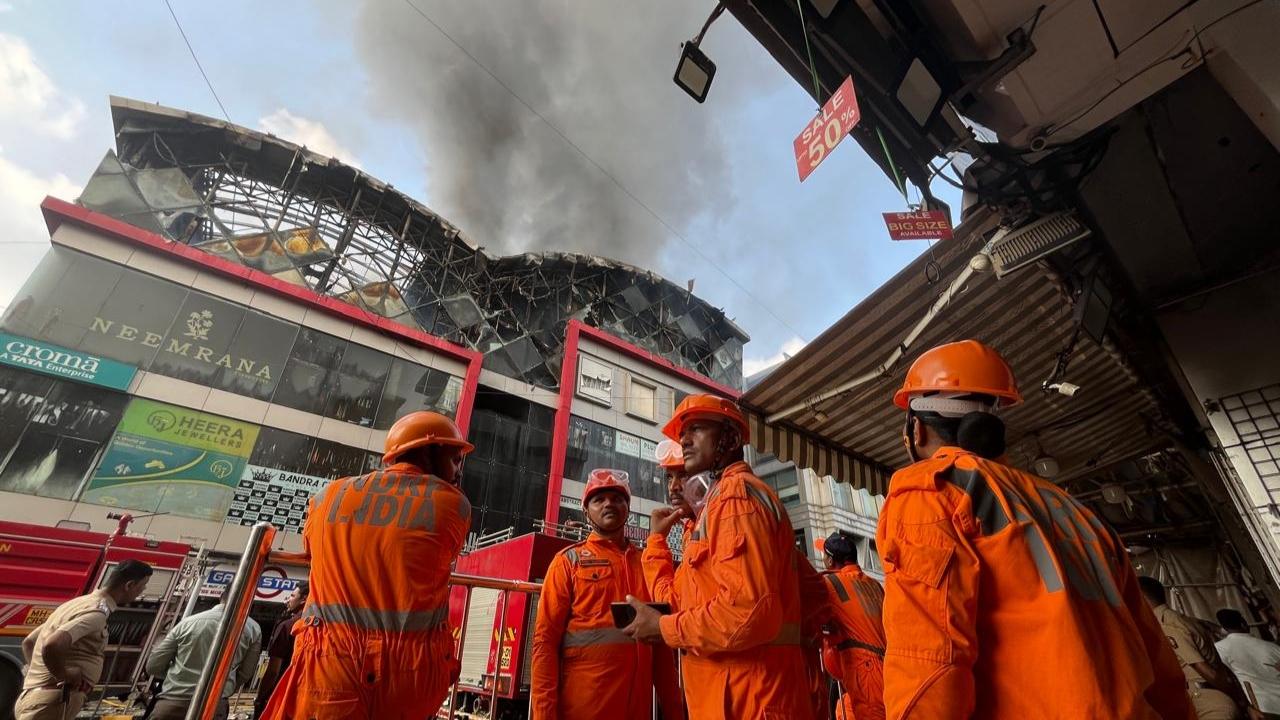 A civic official said the blaze was initially confined to the building's basement, but it later spread to the upper floors of the building, which were engulfed in smoke