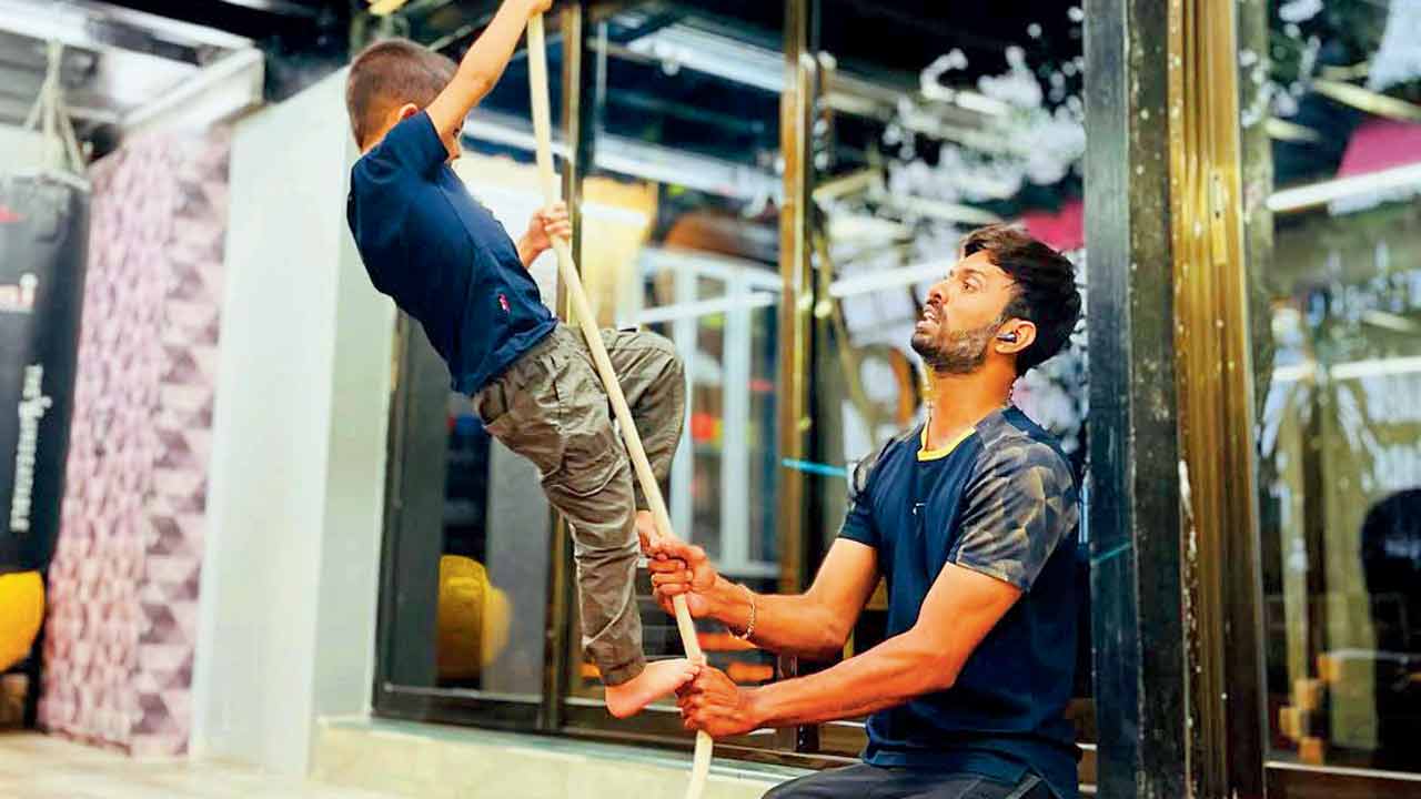 A trainer instructs a child at a gymnastics session. PIC COURTESY/GOFIGUREFITNESSindia on INSTAGRAM
