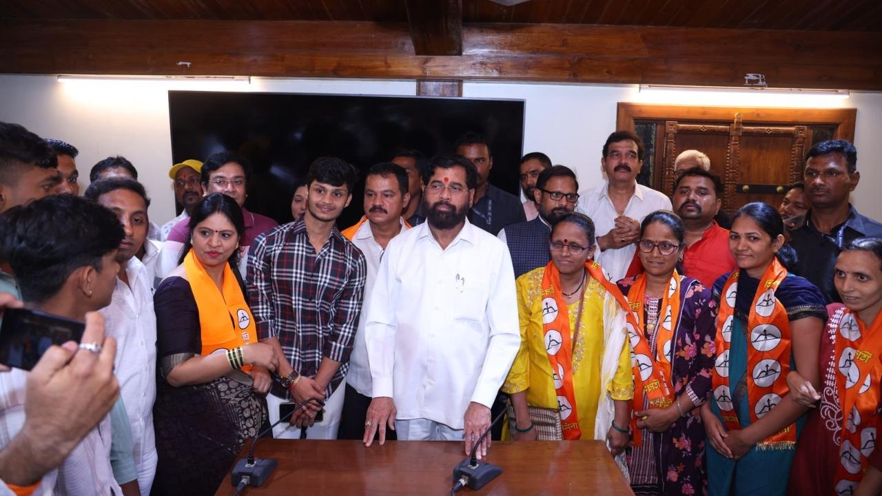 In Photos: Shiv Sena (UBT) workers join Shiv Sena in Thane