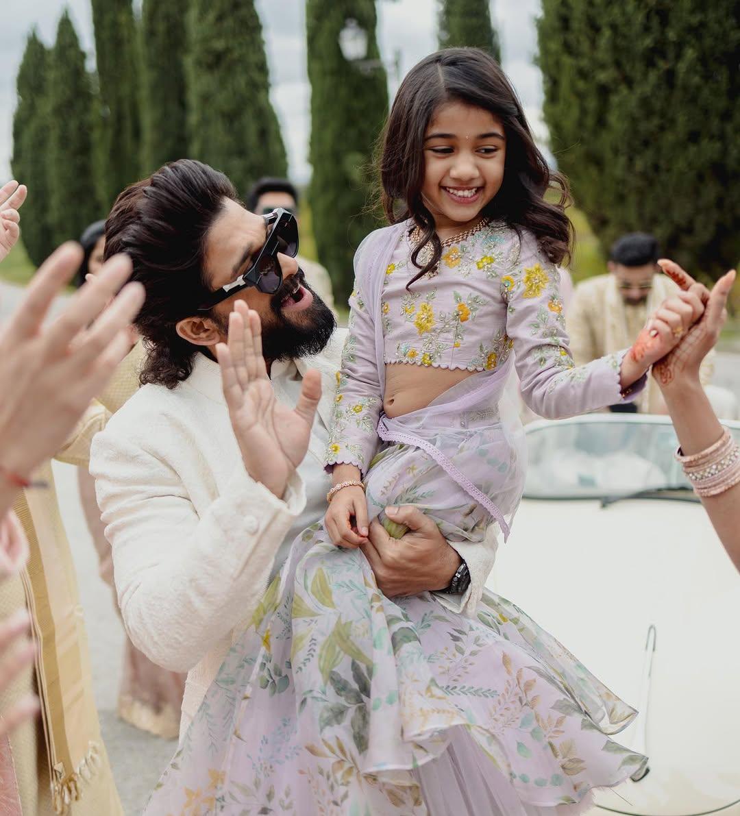 In this picture, the father-daughter duo are seen having the time of their lives as they dance together