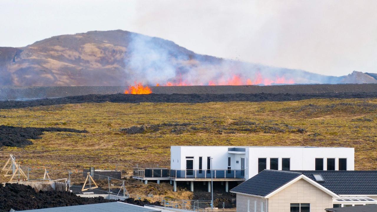 The eruption began at 9:45 am local time (0945 GMT), triggering warning sirens in the town of Grindavik where webcams showed molten rock spewing toward the community